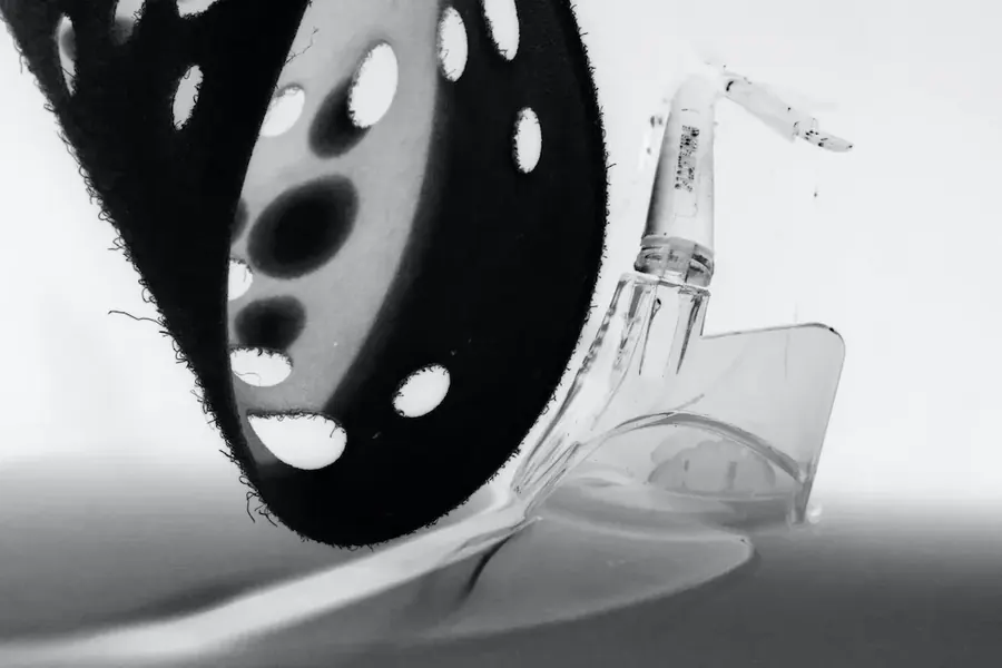 Black and white photography of sandpaper and safety glasses.