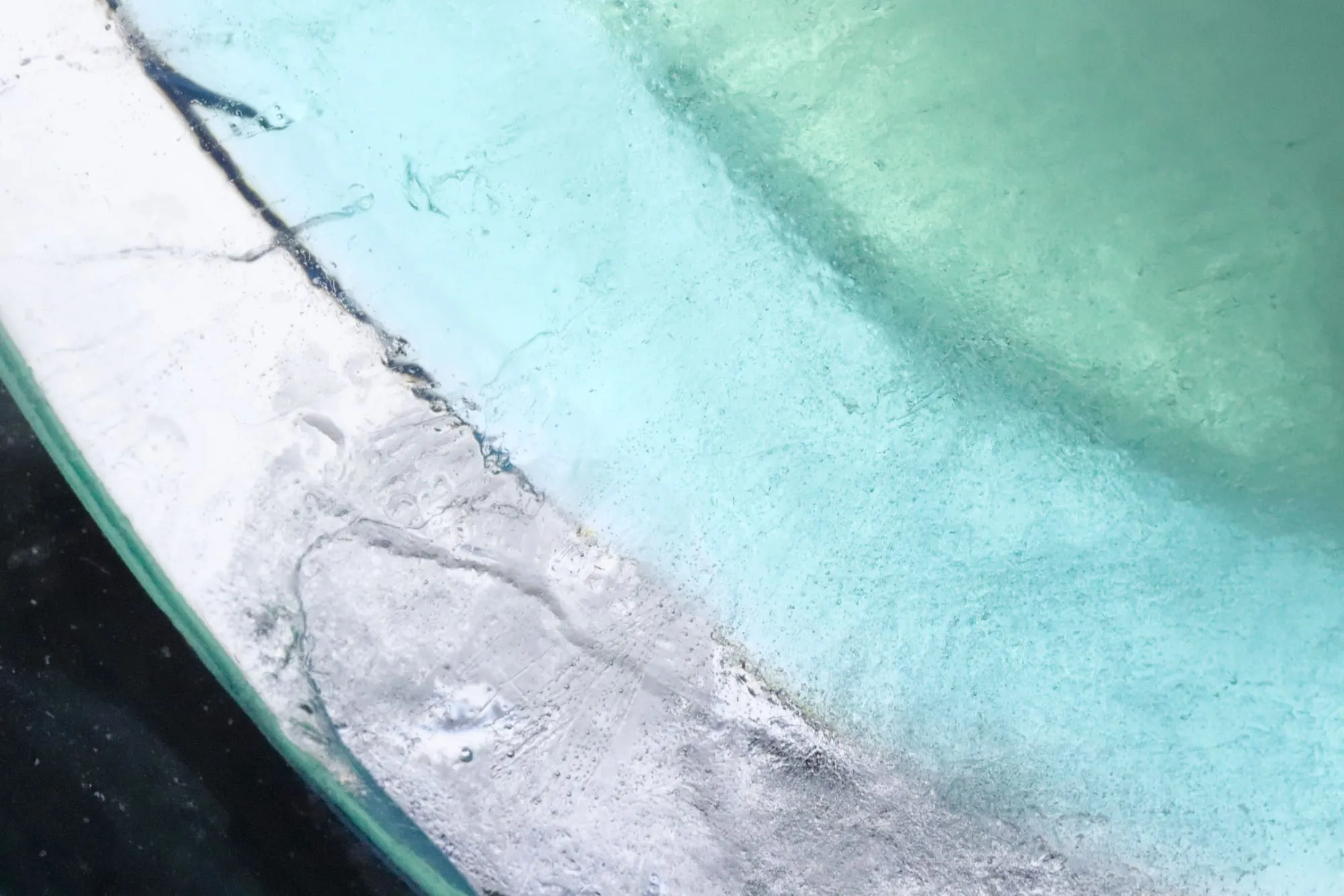 photography of ice showing the texture of it.