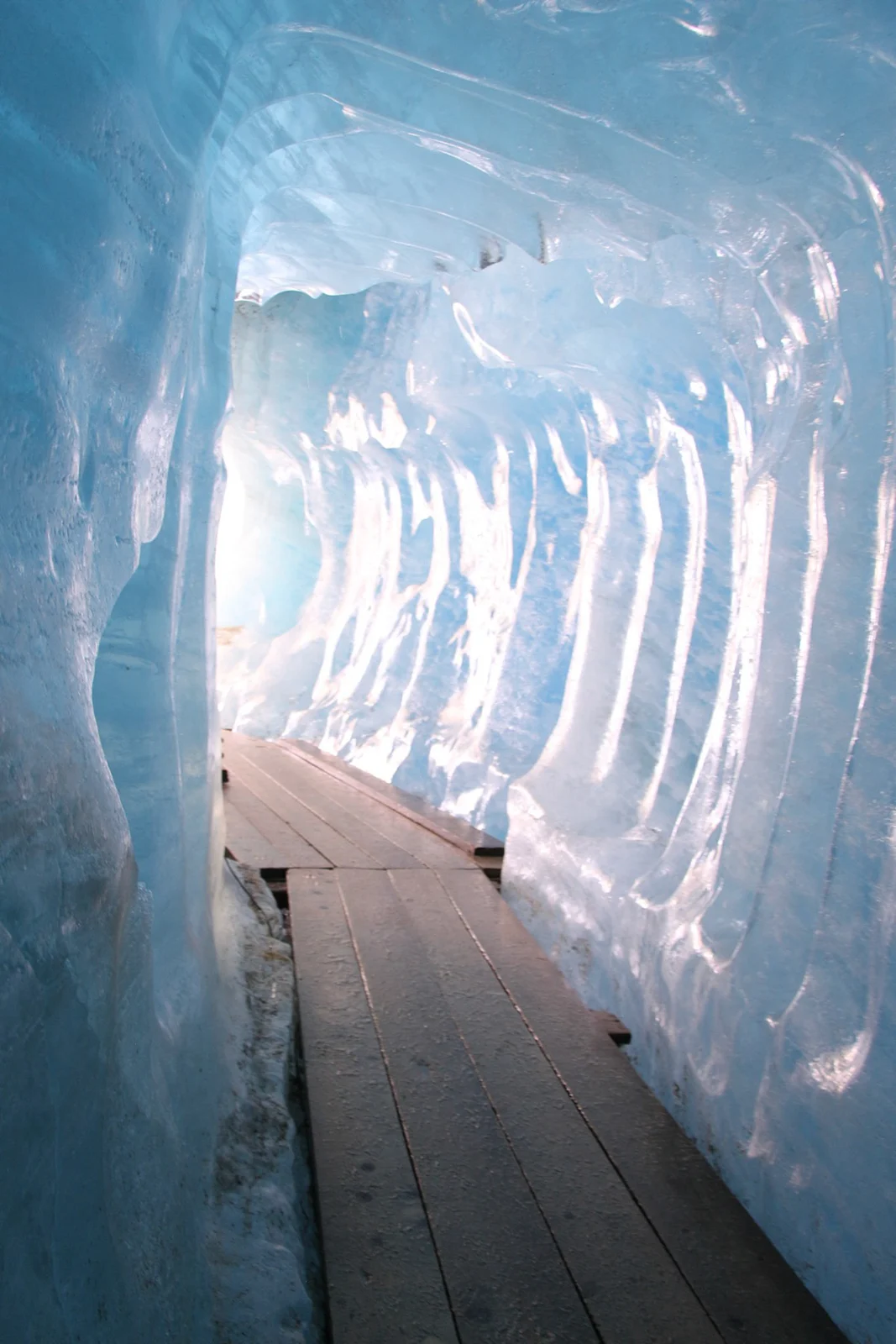 Inside a blue glacier cave