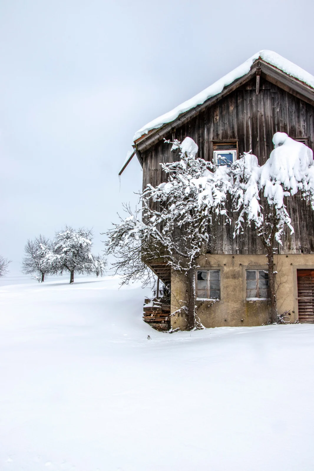 Snowy barn in winter