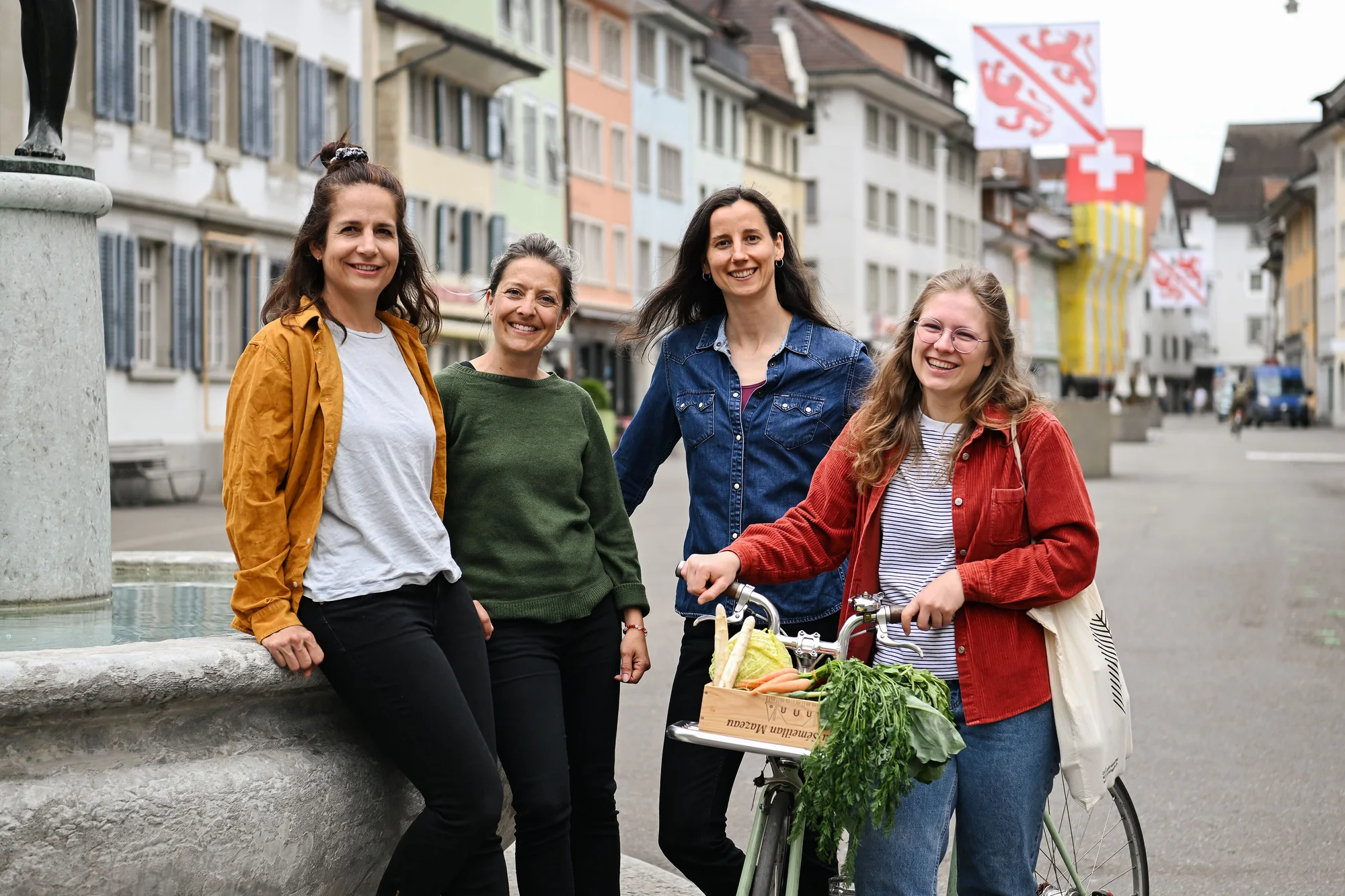 The WiRK team in Winterthur’s old town with a bicycle full of vegetables